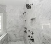 Carrara Marble Brings Luxury to this Brookhaven bathroom built by Waterford Homes